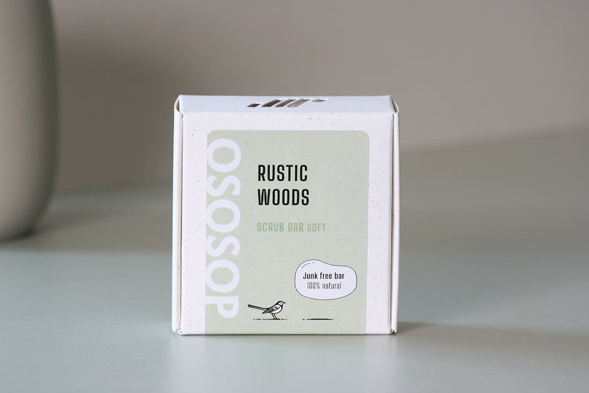 Rustic wood scrub bar with sandalwood powder, gentle exfoliation and herbal forest scent for smooth, healthy skin